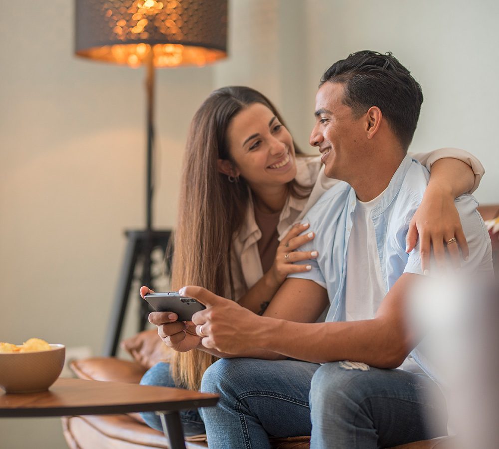 couple-in-love-resting-on-comfy-couch-having-fun-u-2023-11-27-05-37-11-utc